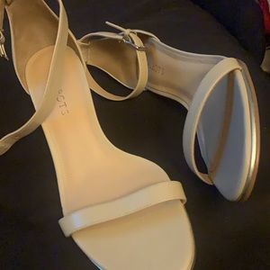 Beige pair of heels